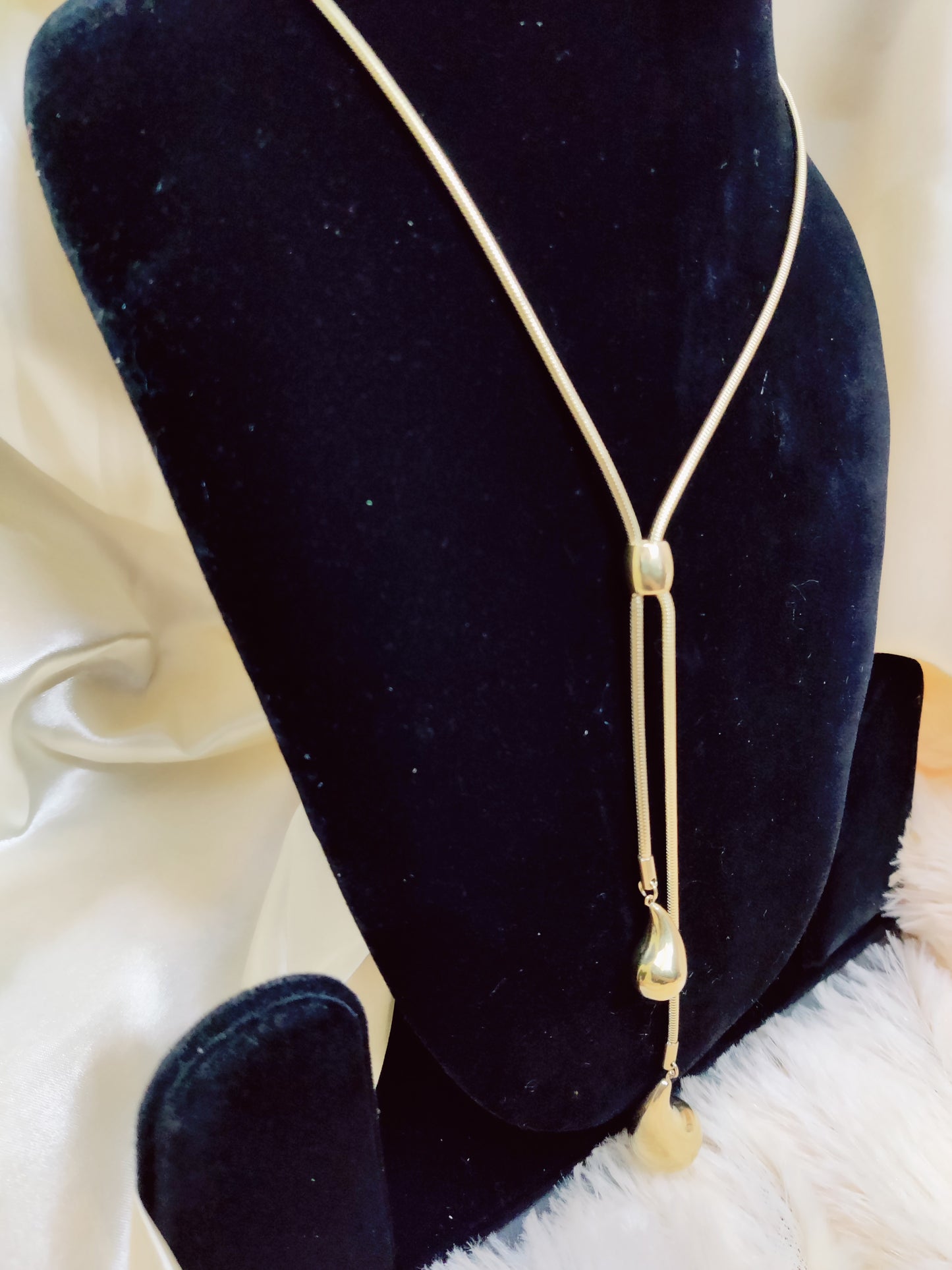 long gold drop neck pendant