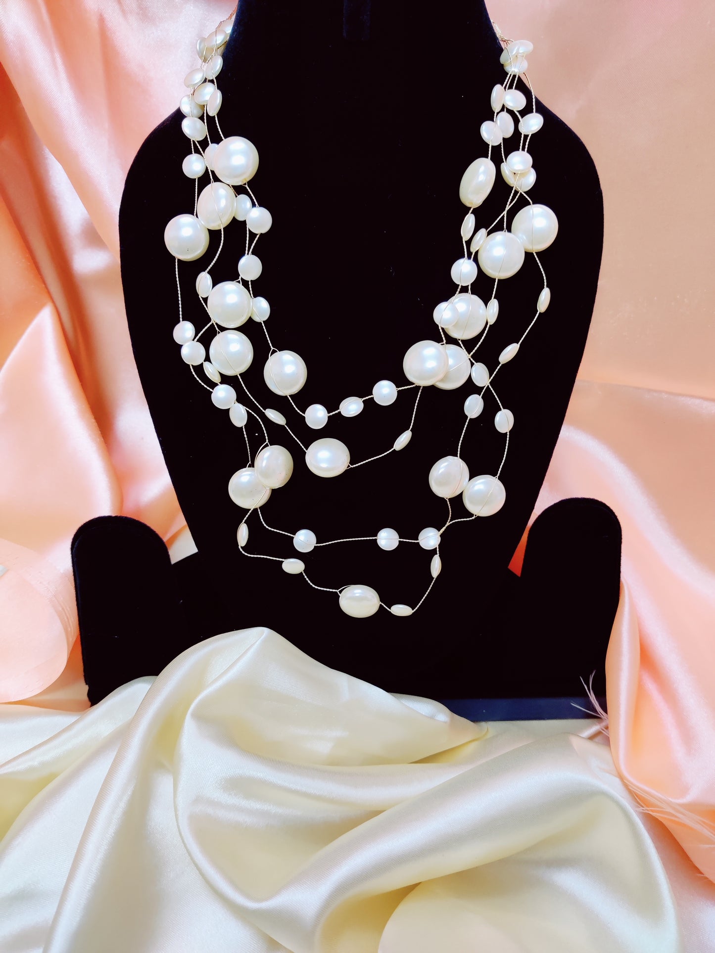 contemporary multistrand pearl neckpiece